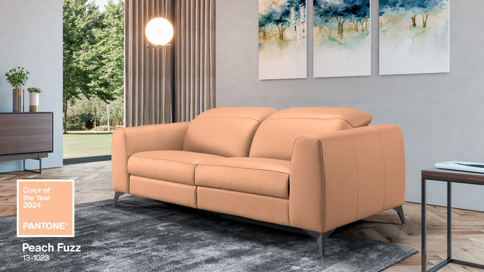 Soft peach-coloured sofa. In the bottom corner you can see Pantone's Peach Fuzz colour choice for 2024.